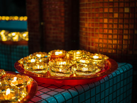 SINGAPORE, 18 MAY 2019 -Buddhist oil lamps during Vesak Day celebrations at Bright Hill temple. Oil lamps symbolise wisdom and enlightenment in Buddhismのeditorial素材