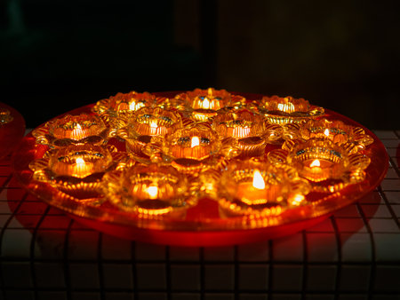 SINGAPORE, 18 MAY 2019 -Buddhist oil lamps during Vesak Day celebrations at Bright Hill temple. Oil lamps symbolise wisdom and enlightenment in Buddhismのeditorial素材