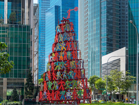 RAFFLES PLACE, SINGAPORE - 15 MAR 2019 - Sculpture "Momentum" by David Gerstein at Raffles Place with the office towers of the Central Business District in the background. The sculpture is an iconic landmark of the Singapore CBDのeditorial素材