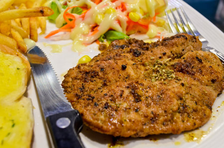 Thai pork steak on a plate with whiteの写真素材