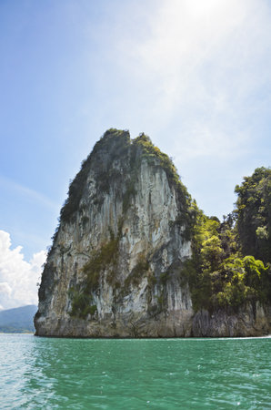 Beautiful island surrounded by water, Natural attractions in Ratchapapha dam at Surat Thani province, Guilin of Thailand の写真素材