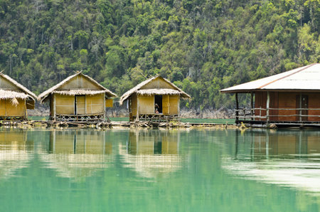 Small bungalow made of bamboo floating  Surrounded by mountains and water in Ratchaprapha Dam, Khao Sok National Park, Surat Thani Province, Thailand のeditorial素材