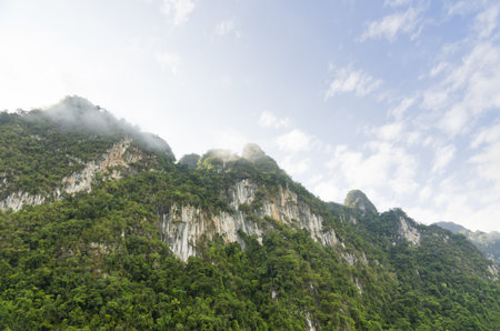 Beautiful high mountains in the morning at Ratchaprapha Dam, Khao Sok National Park, Surat Thani Province, Thailandの写真素材