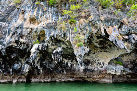 Exotic stone caves of the island by sea erosion for a long time in Ao Phang Nga Bay National Park Thailandの写真素材