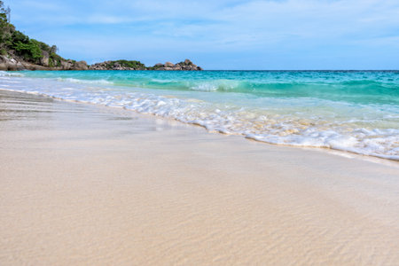 Beautiful landscape blue sea white sand and waves on the beach during summer at Koh Miang island in Mu Ko Similan National Park, Phang Nga province, Thailandの写真素材