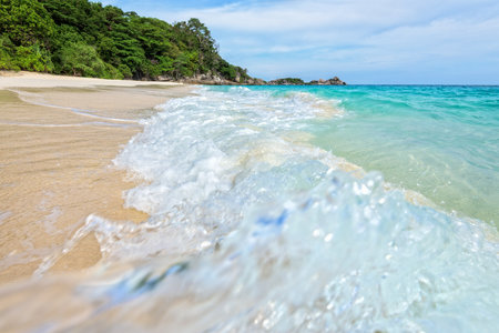 Beautiful landscape blue sea white sand and waves on the beach during summer at Koh Miang island in Mu Ko Similan National Park, Phang Nga province, Thailandの写真素材