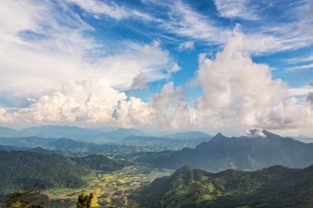 Beautiful landscape blue sky with white cloud above high mountain of the Phi Pan Nam Range from view point on Phu Chi Fa Forest Park in Chiang Rai Province Thailandの写真素材