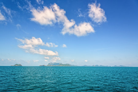 Beautiful natural seascape of the sea under bright blue sky in summer, overlooking the horizon at Mu Ko Ang Thong National Marine Park is a famous tourist destination Surat Thani province, Thailand.の写真素材