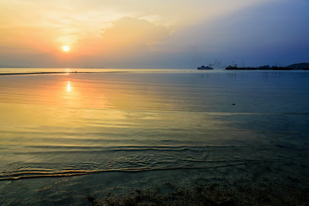 Beautiful nature landscape of Nathon Pier and boat on the sea. And colorful of the sunset sky at Nathon Beach Viewpoint, Ko Samui island, Surat Thani, Thailandの写真素材