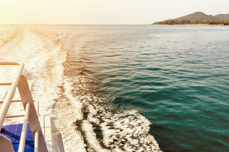 Vintage style beautiful natural landscape of sky and blue sea while travel by speed boat in summer to Ko Pha Ngan island in Gulf of Thailand is a famous attractions of Surat Thani province, Thailandの写真素材
