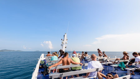 SURAT THANI, THAILAND-APRIL 28, Group of tourists on the deck are relax and enjoy the natural landscape of sea in summer during the travel by boat at Koh Samui island, APRIL 28, 2017 in Thailandのeditorial素材