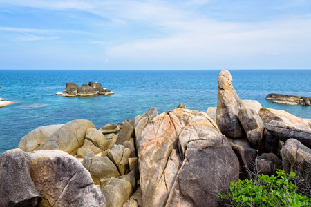 Hin Ta Hin Yai is a symbol famous tourist destinations, Beautiful rock coastline near the blue sea under the summer sky at Lamai beach of Koh Samui island, Surat Thani province, Thailandの写真素材