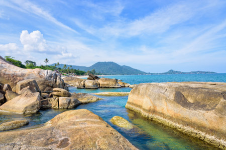 Beautiful natural landscape of the rock and the blue sea at coastline near the Hin Ta Hin Yai scenic view is a symbol famous tourist destinations of Koh Samui island, Surat Thani province, Thailandの写真素材