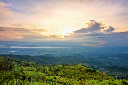 High view beautiful nature landscape of colorful sky during the sunrise on top of the mountain at Phu Thap Berk viewpoint, famous tourist attractions of Phetchabun Province, Thailandの写真素材