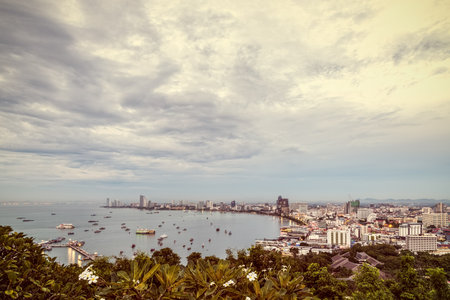 Vintage style, high view on viewpoint see cityscape at the beach and the sea of Pattaya Bay,...
