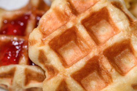 Top view close up of fresh waffles delicious sweet. Making homemade food or dessert at homeの写真素材