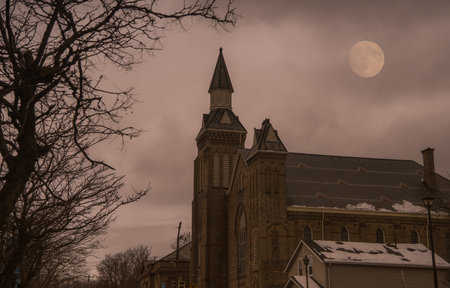 Building on Cloudy Nightの写真素材