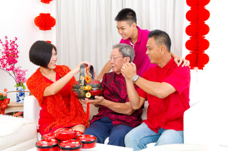 Asian three generations family celebrate chinese new yearの写真素材