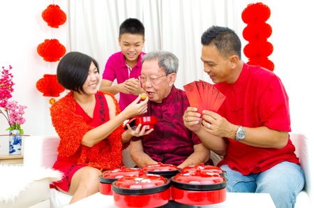 Asian three generations family celebrate chinese new yearの写真素材