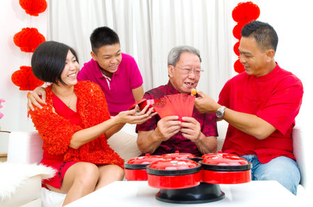 Asian three generations family celebrate chinese new yearの写真素材