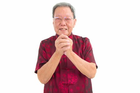 Asian senior man celebrate chinese new yearの写真素材