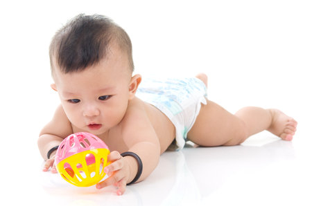 crawling cute asian baby boyの写真素材