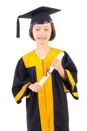 Asian kid in graduation gownの写真素材
