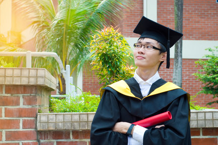 Confident asian university graduateの写真素材