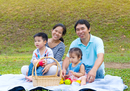 Outdoor portrait of asian familyの写真素材