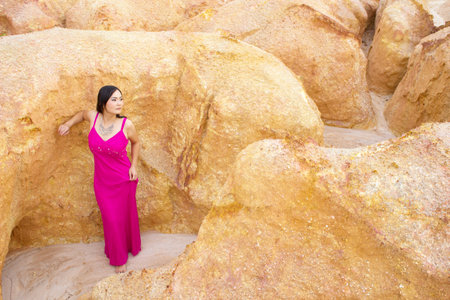 Asian young woman with canyon background.の写真素材