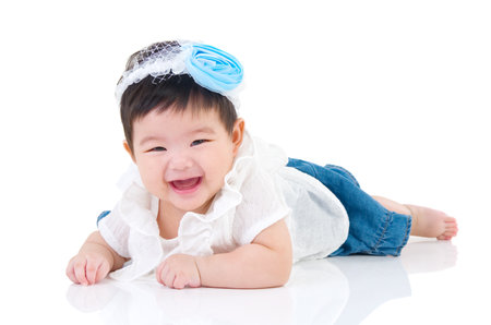 crawling beautiful baby girlの写真素材