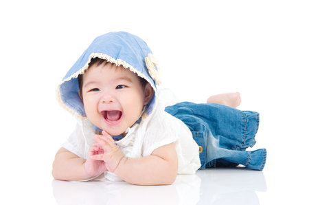 crawling beautiful baby girlの写真素材