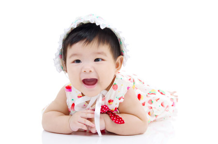 crawling beautiful baby girlの写真素材