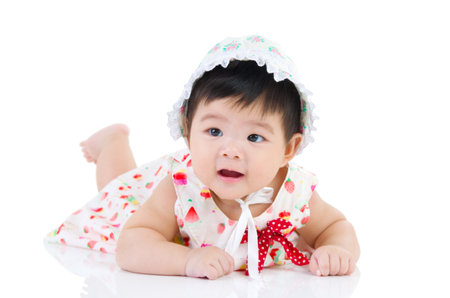 crawling beautiful baby girlの写真素材
