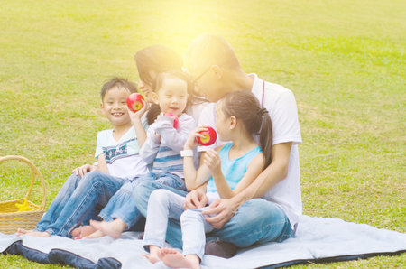 asian family having fun time at outdoorの写真素材