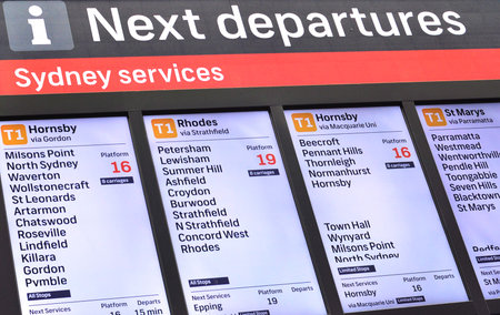 Sydney, Australia. - On August 12, 2017. - Central Railway Station at the transport information center which is showing departures timetable on the screen.のeditorial素材