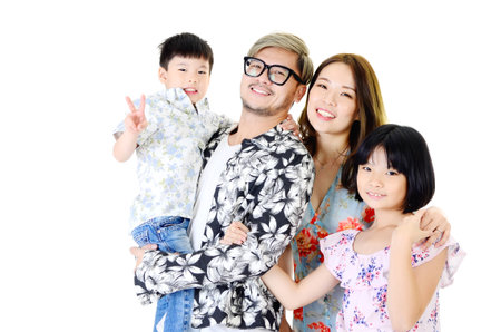 Indoor portrait of asian family at homeの写真素材
