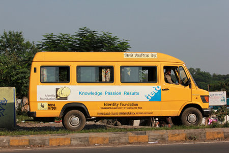 Pune, India - October 22, 2011  School Bus in Pune city  Children from poor families travel to...