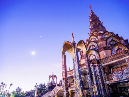 Bright Starry Night over the sky at Wat Phra Thart Pha Kaew, is a Buddhist monastery and temple in...