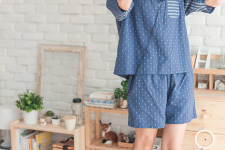 Focus on lower body of a young girl in the casual wear and polka-dots styleの写真素材