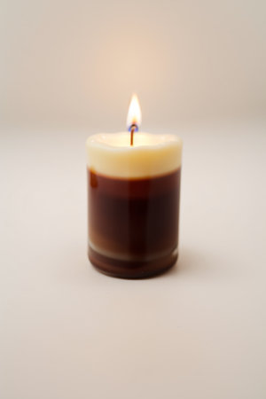 Burning candle on white background.の素材