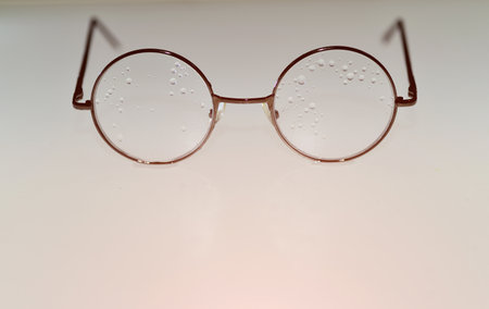 Drops with glasses isolated on white spaceの写真素材