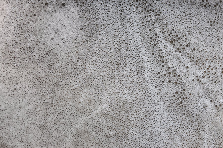 Bubbles are dispersed in water containing chemicals.の写真素材