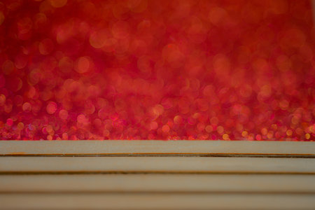 Light-colored wood floor with empty space with red light background bokeh Abstract Christmasの写真素材