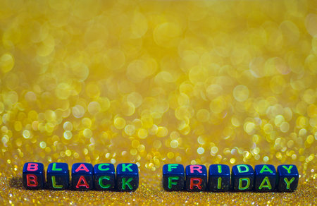 Black Friday, with free space and bokeh background light golden tone.の写真素材
