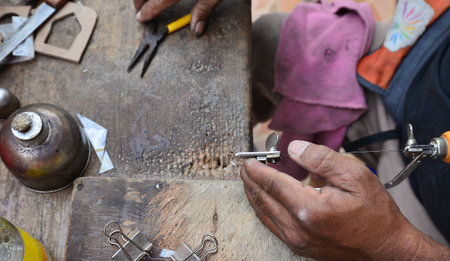 Rough and dirty hands of work while using the tool.の写真素材