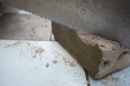 close up saw blades cutting concreteの写真素材