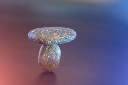Balance the boulders concept together on a colorful background.の写真素材