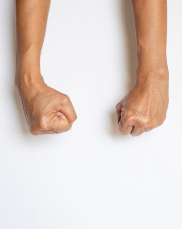 The gesture of the person's hand and finger on a white backgroundの写真素材