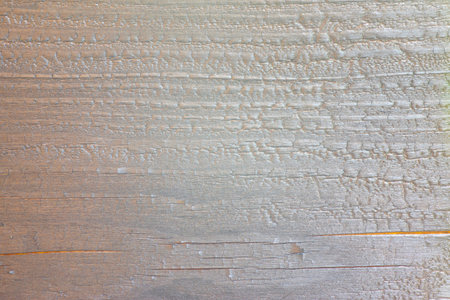 The texture of the wood grain color has cracks from burning.の写真素材